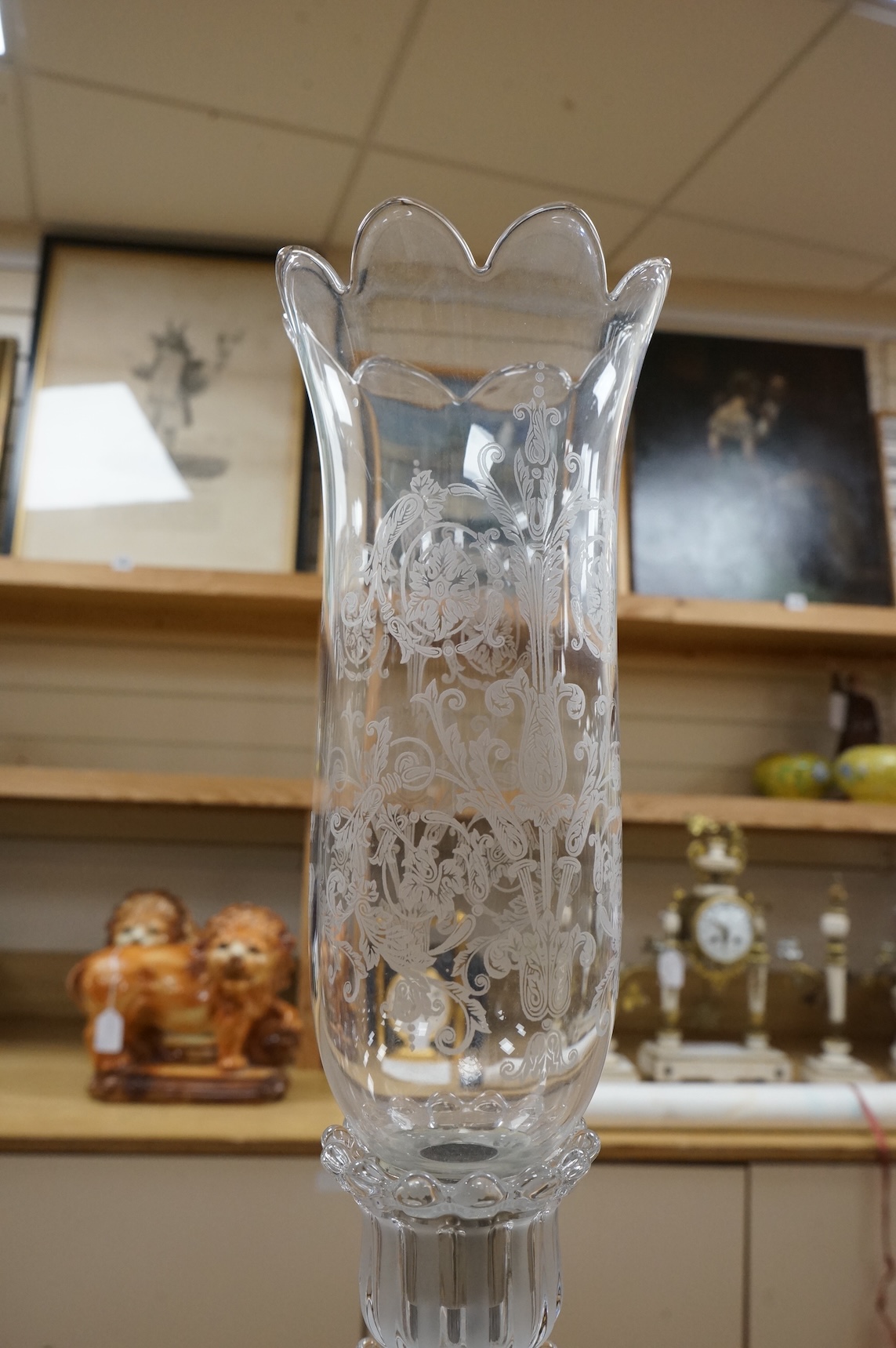 A Baccarat lustre drop figural glass candlestick, 62cm